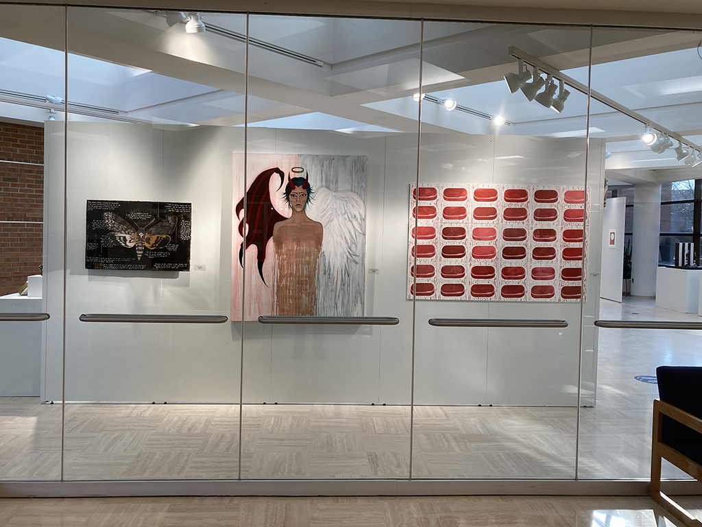 front glass wall of Bfa exhibition viewed from Lobby. Tera Peters (L-2) Alexia Hall (R-1)
